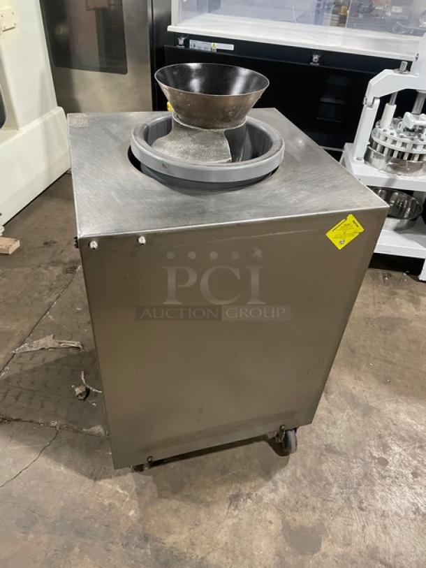 AM Manufacturing R-900RT commercial dough rounder, stainless steel, 120V 1 Phase, on casters, visible yellow tag.