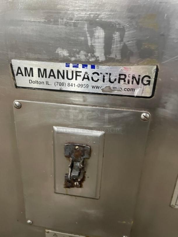 AM Manufacturing Round-O-Matic Series R900RT stainless steel dough rounder, model R-900RT, 120V 1 Phase, on casters, label visible.