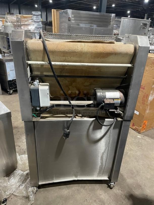TMB Baking commercial stainless steel electric dough sheeter, floor model on casters, with visible motor and power cable.