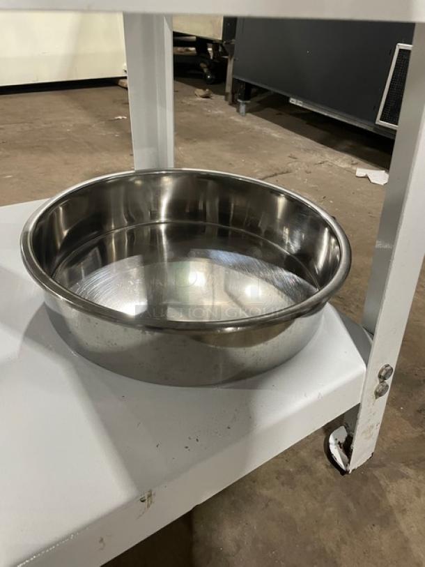 Migsa commercial white manual dough divider with stainless steel bowl, single undershelf, and legs, shown in good condition.