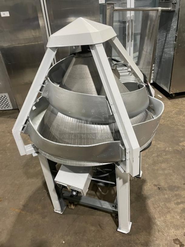 Benier commercial electric conical dough rounder on legs and casters, in good condition. Freestanding all-round model.