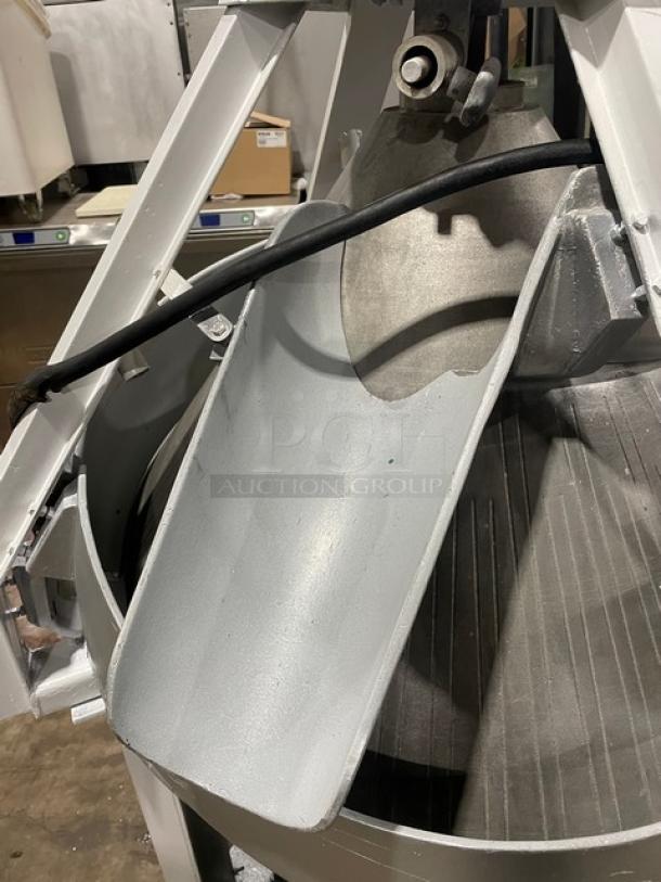 Benier electric conical dough rounder on legs and casters, commercial use, metallic finish, excellent condition.