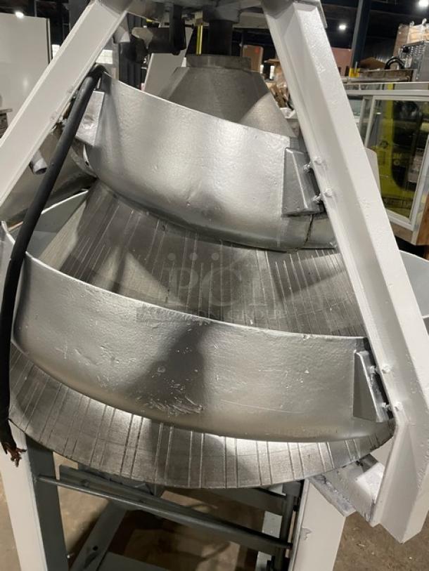 Benier commercial electric conical dough rounder on legs and casters. Metallic finish, sturdy build, gently used condition.