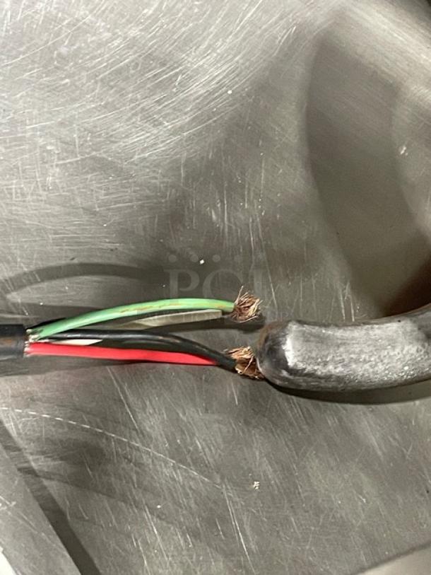 VMI SPI220M electric spiral mixer with bowl guard, stainless steel bowl, and spiral dough hook, 220V 3-phase. Wiring exposed.