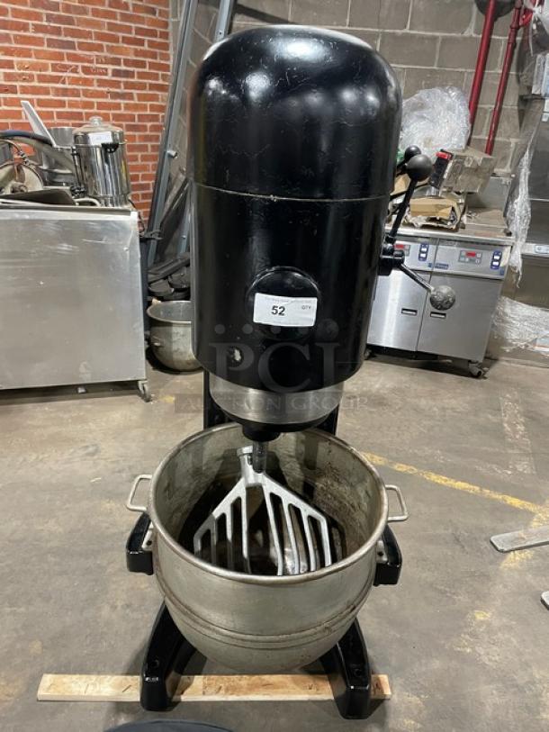 Hobart M802 black 80 qt. planetary dough mixer with mixing bowl and flat beater, 200V, 3-phase, on legs.