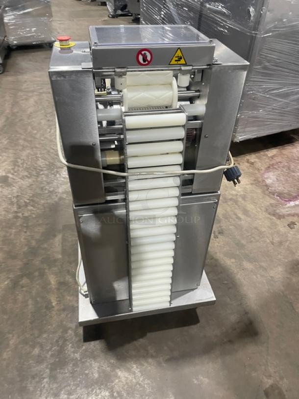 Minipan MGX dough sheeter, stainless steel, electric 220V 3 phase, with conveyor, on casters, excellent condition.