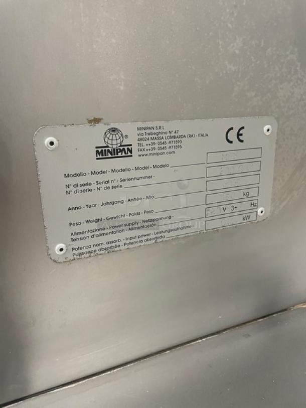 Minipan MGX commercial stainless steel dough sheeter, electric-powered, 220V 3 phase, on casters. Features conveyor and model label.