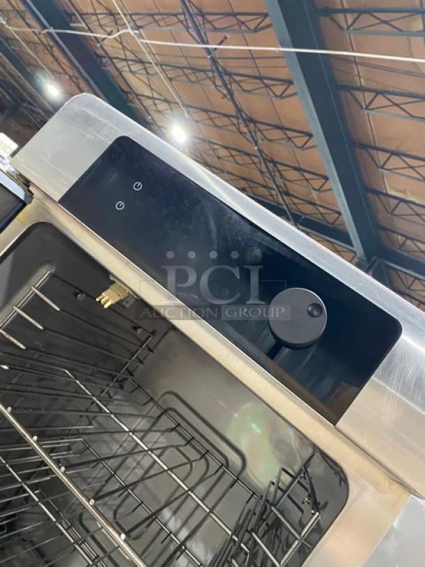 Alto-Shaam 1200TH Halo Heat Series oven, stainless steel, electric, half door, wired rack, simple controls, on casters.