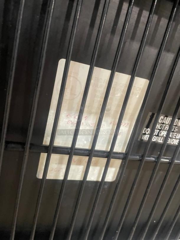 Marc Commercial Stainless Steel Curved Glass Refrigerated Display Case; includes label with specifications and safety instructions.