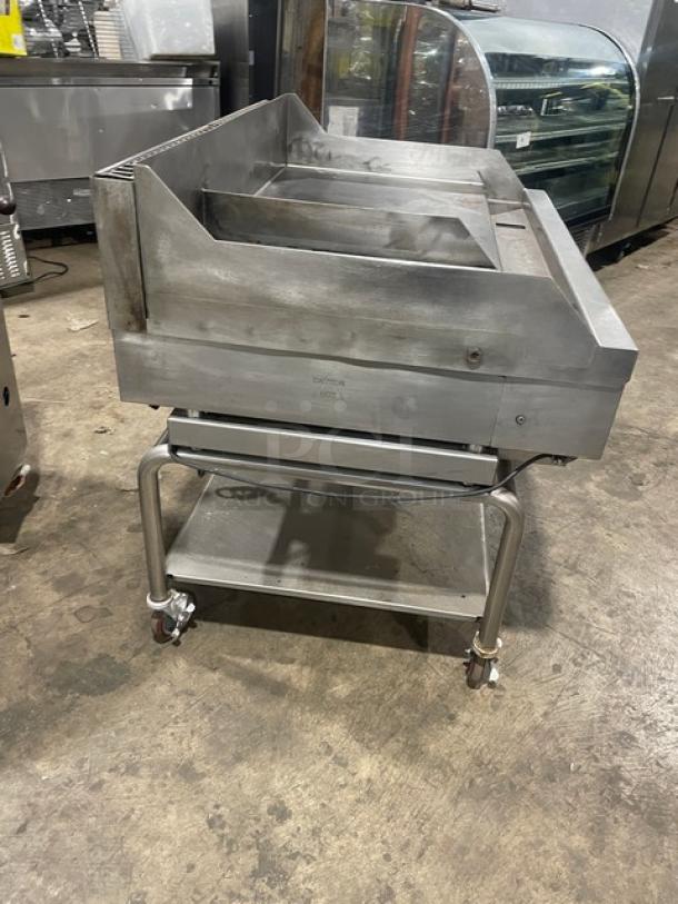 WoodStone stainless steel gas countertop plancha flat griddle with back and side splash, single undershelf stand on casters.
