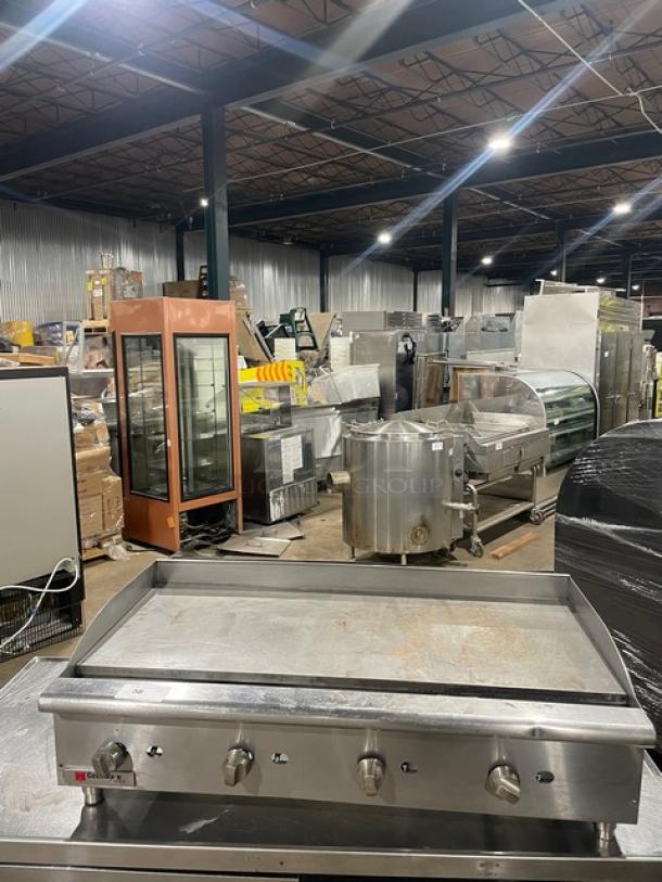 Cecilware Pro Series stainless steel gas countertop flat griddle with back and side splash, on legs, in used condition.