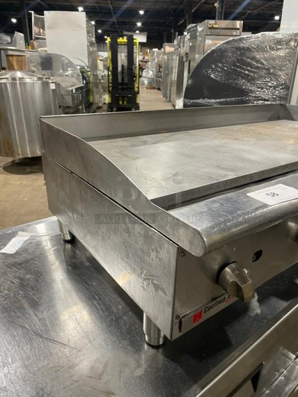 Cecilware Pro Series stainless steel gas griddle with back and side splash, on legs. Visible brand logo. Used condition.