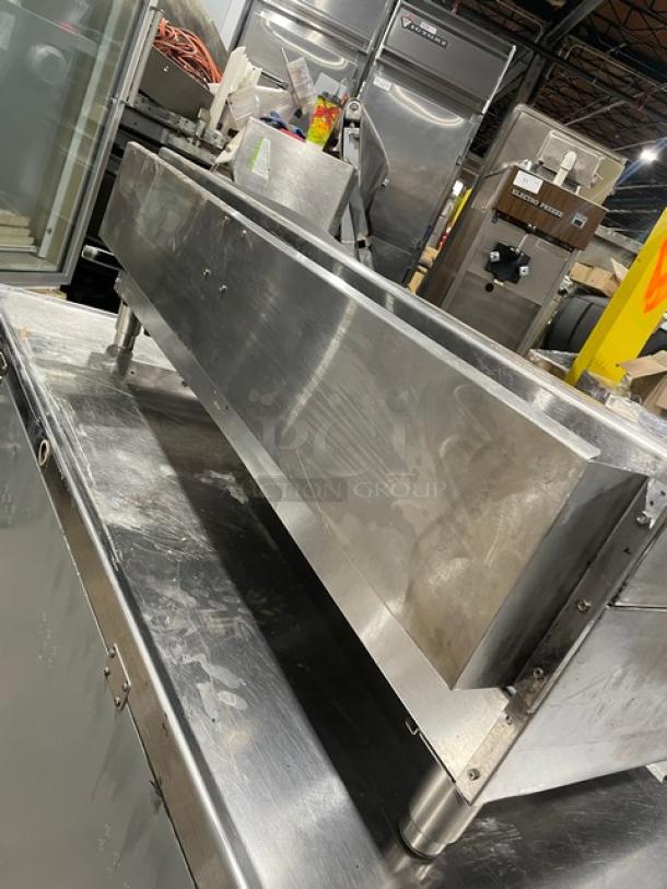 Cecilware Pro Series stainless steel gas countertop flat griddle with back and side splash, on legs; commercial-grade.