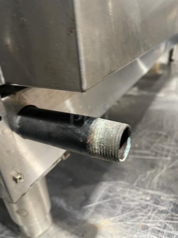 Cecilware Pro stainless steel gas countertop griddle with back and side splashes, on sturdy legs, in used condition.