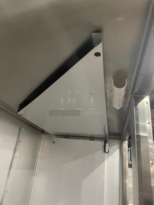 Traulsen ARI232LUTFHS stainless steel commercial roll-in refrigerator interior, Energy Star certified, excellent condition.