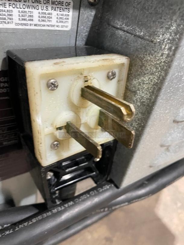 Turbochef I3 commercial oven power plug detail, showing three-prong 208/240V connector. Model: I3 SN: I3-D00175.