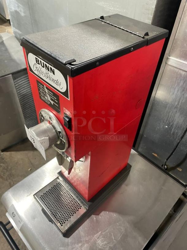 Bunn G3 red electric countertop bulk coffee grinder, Model SN: 8406, 120V 1 Phase, showing control dial and label.
