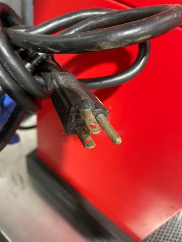 Bunn G3 red electric bulk coffee grinder, 120V, 1 phase, with standard power cord. Countertop model in good condition.