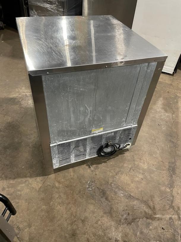 Beverage-Air UCR27A stainless steel undercounter refrigerator, single solid door, poly coated wire rack, 115V 1 phase, on casters.