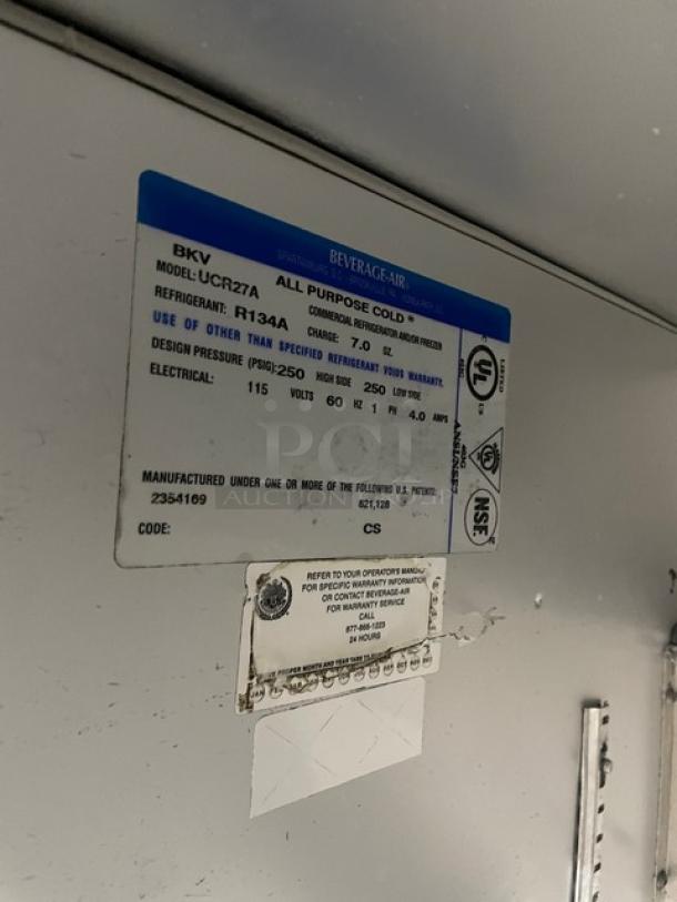 Beverage-Air UCR27A commercial undercounter fridge label, showing model, refrigerant R134A, 115V, and safety certifications.