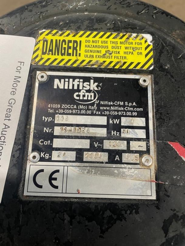 Nilfisk CFM Model 118 industrial vacuum cleaner label, showing specifications and warning for HEPA filter use.