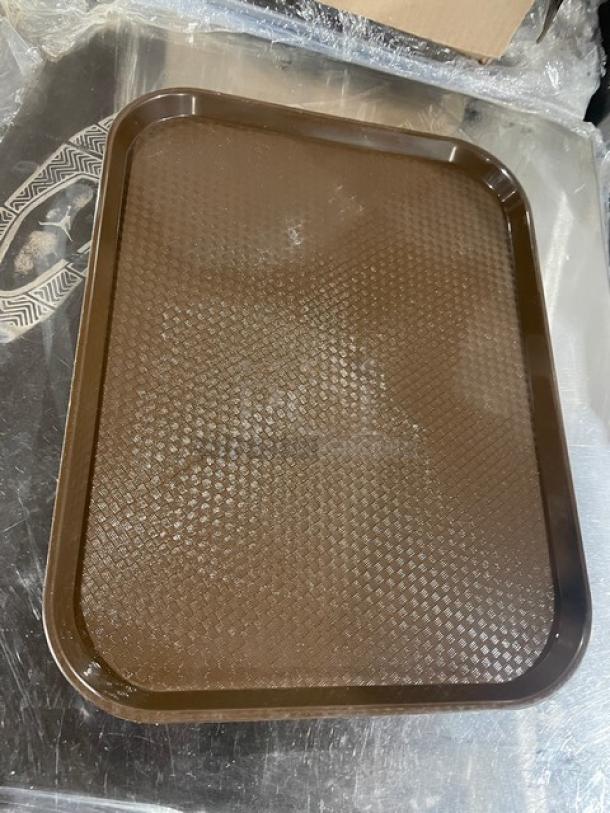 Cambro brown 14"x18" rectangular fast food tray, model 1418FF167. New condition, textured surface for gripping.