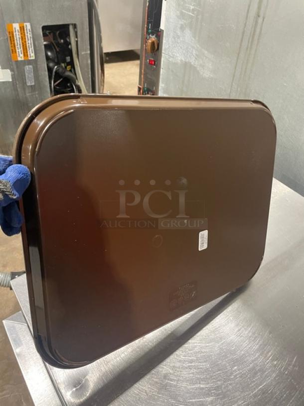 New Cambro brown 14"x18" rectangular fast food/serving tray, model 1418FF167, in pristine condition.