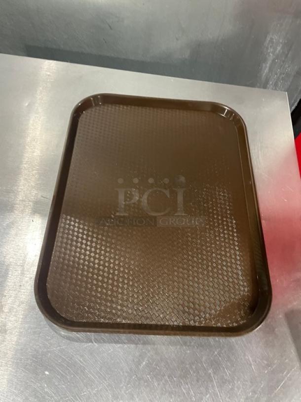 Cambro 1418FF167 brown 14"x18" rectangular serving tray, new condition, textured surface, ideal for commercial use.