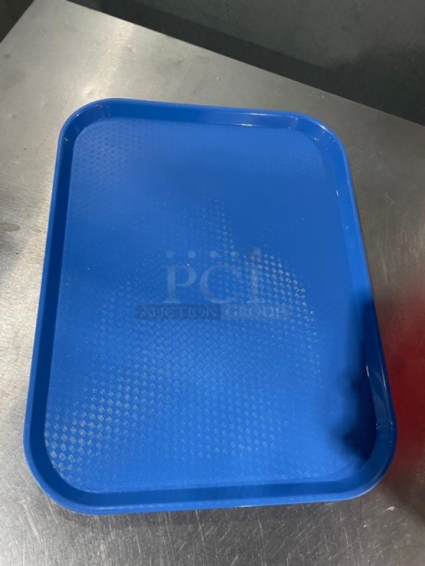 Blue Cambro 14"x18" fast food/serving tray, model 1418FF168, new condition, textured surface for grip.