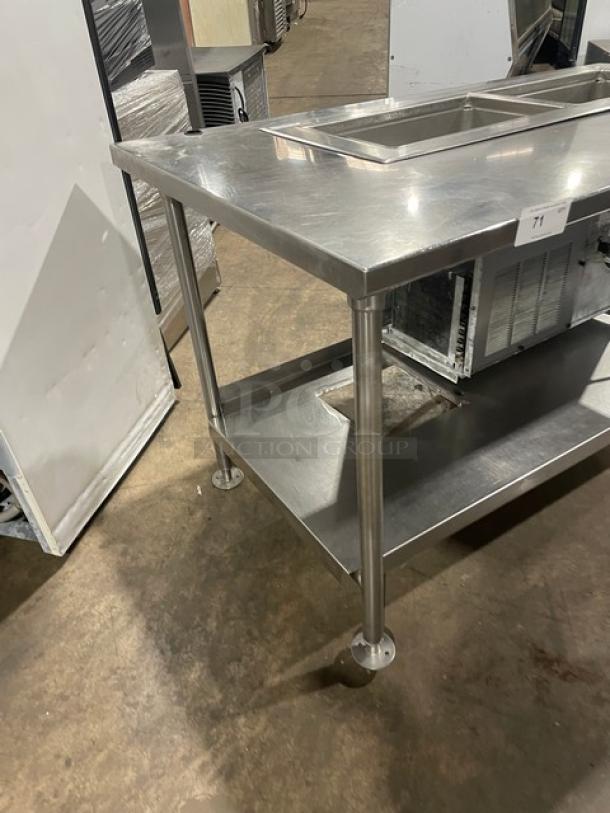 Delfield 8148EFNP stainless steel 2-well drop-in cold food table with undershelf, electric-powered, on legs, 115V.