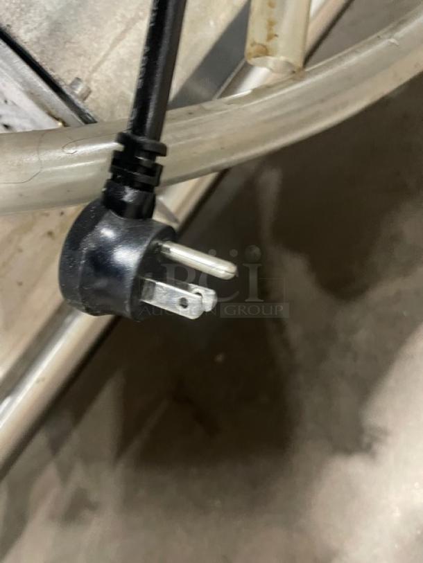 Power cord of Delfield Model 8148EFNP commercial refrigerated food table with 115V plug.