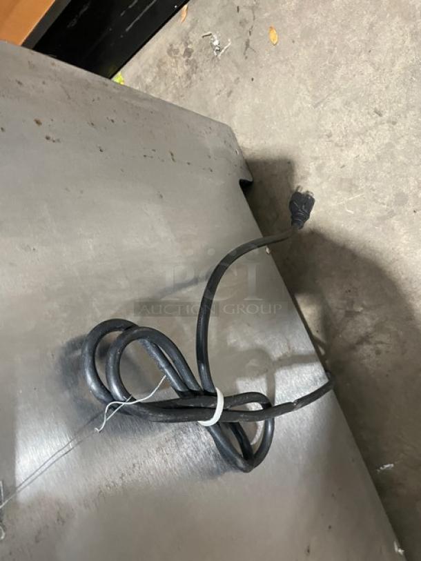 Cornelius ED250BCZ commercial beverage dispenser, stainless steel, eight-flavor, push button control, 115V, visible power cord.