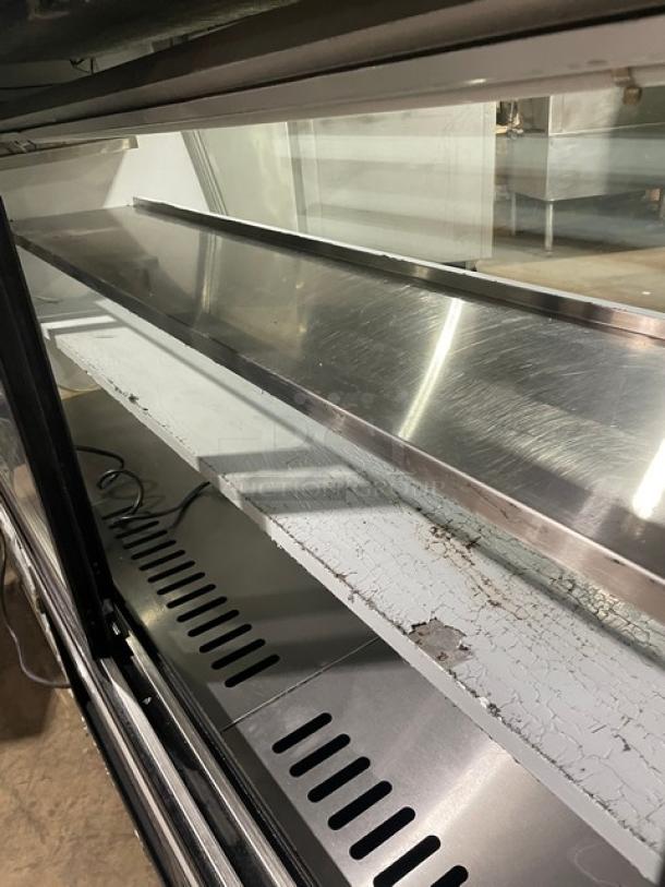 Leader Model ERHD72ES refrigerated deli display, stainless steel, 72", slanted glass, adjustable shelves, rear sliding doors.