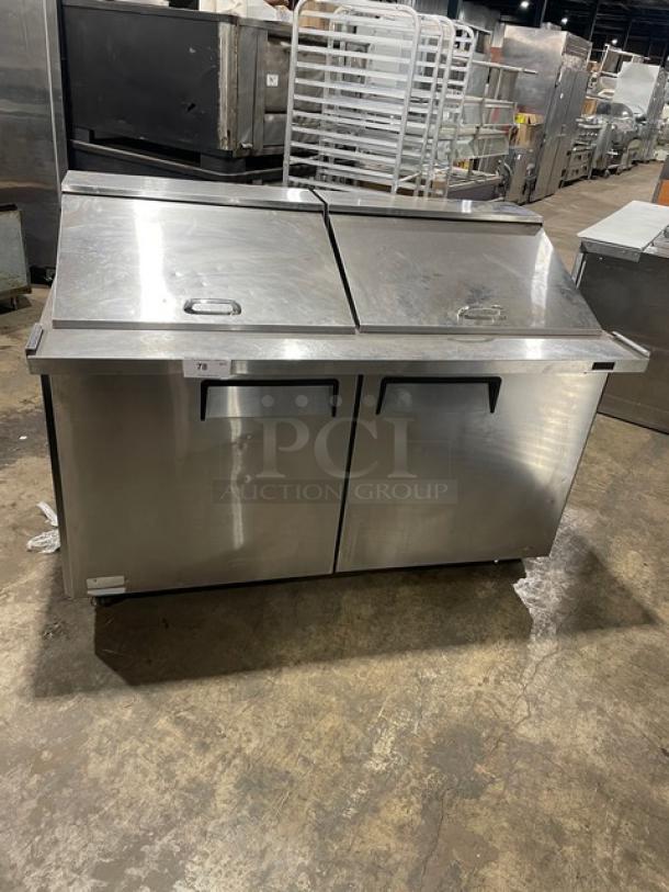 Turbo Air M3 Series stainless steel 2-door refrigerated prep table, model MST-60-24-N, on casters, with poly coated wired rack.