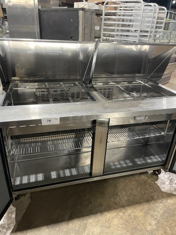 Turbo Air 2 Door Stainless Steel Prep Table, Model MST-60-24-N, with poly-coated wire rack, refrigerated, on casters.