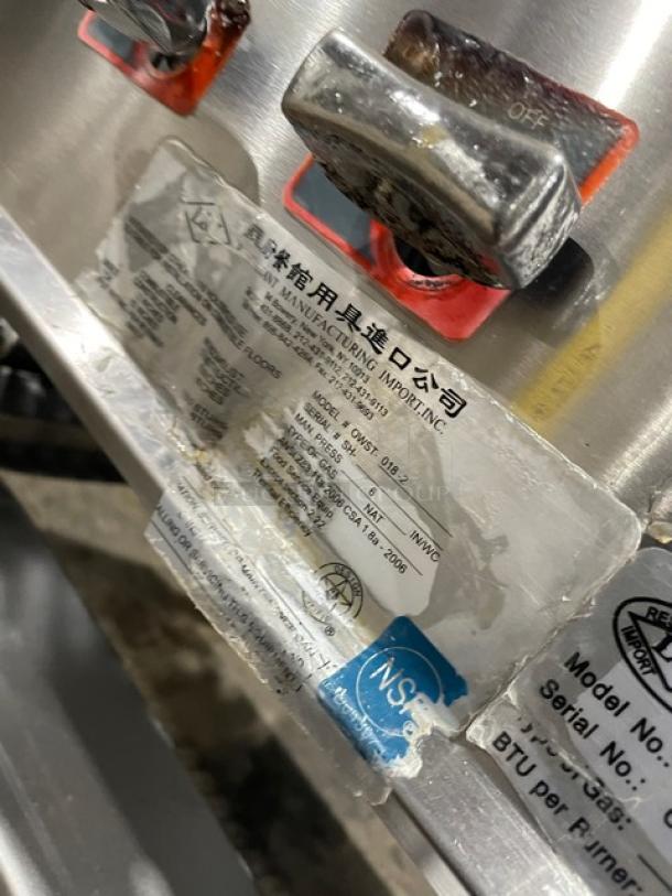 L&J Commercial Stainless Steel Gas Burner, Model OWST0182, with visible labels showing specs and certification markings.