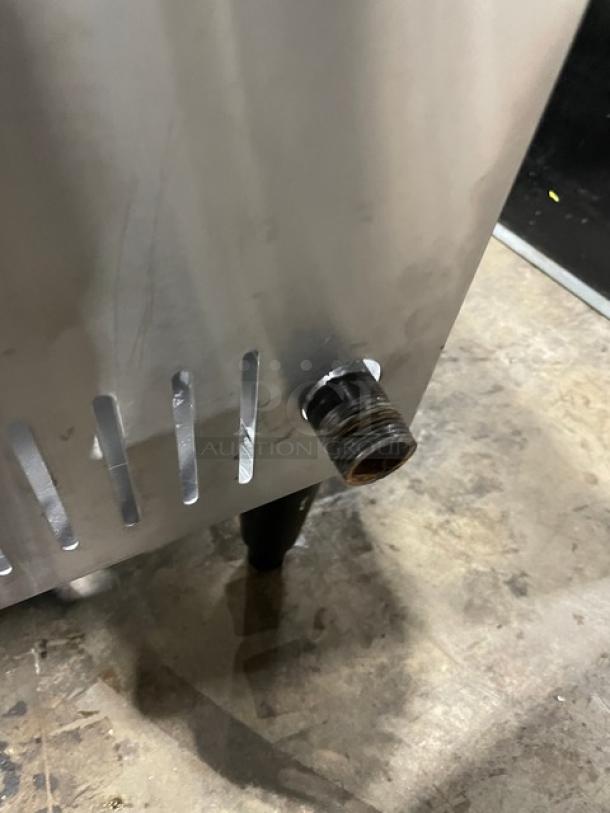 L&J stainless steel single burner stock pot range, model OWST-018-2, on legs, natural gas powered, in good condition.