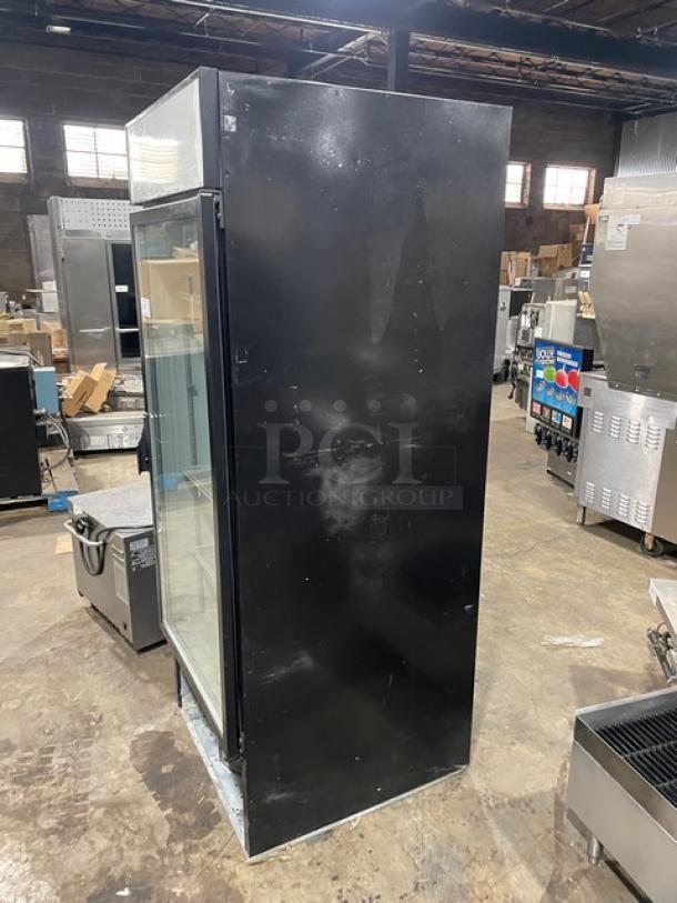 Beverage-Air MT27 black single glass door merchandiser refrigerator, poly coated wire rack, 115V, good condition.