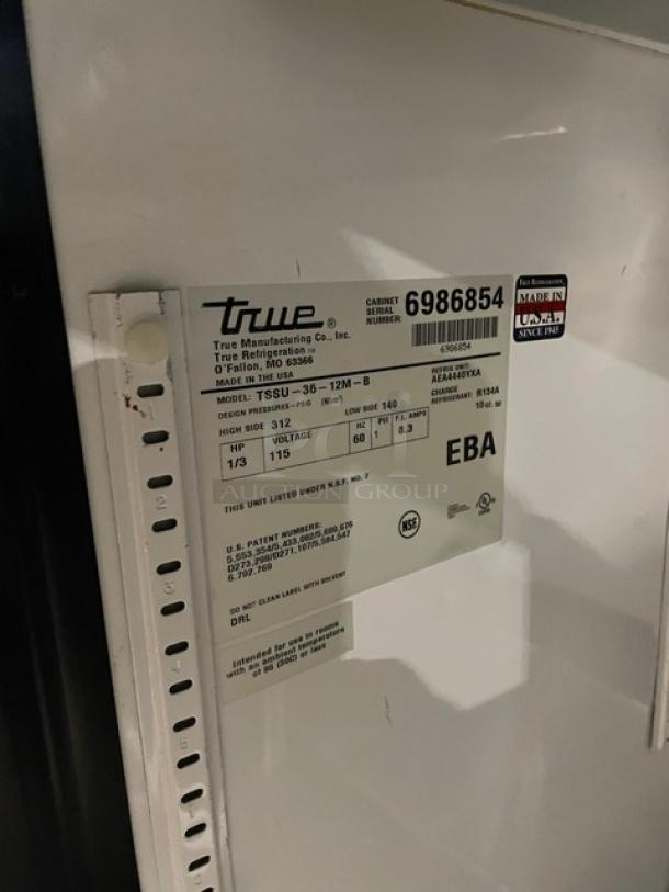 True Commercial Stainless Steel Prep Table, Model TSSU-36-12M-B, SN: 6986854, 115V, on casters, visible manufacturer's label.