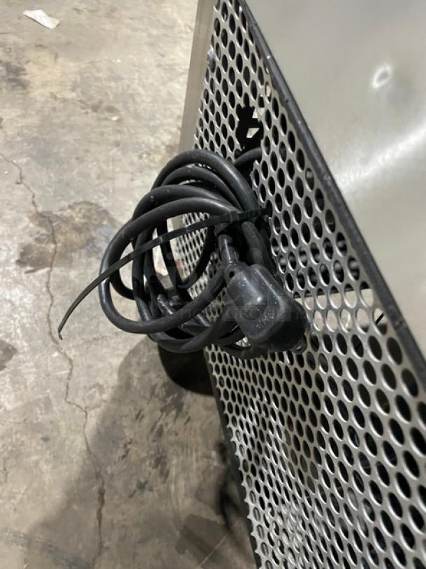 True Commercial Stainless Steel 2-Door Refrigerated Mega Top Prep Table, Model TSSU-36-12M-B, on casters.