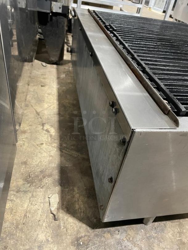 Turbo Air Radiance Series gas-powered countertop char broiler with cast iron grates, stainless steel, on legs, used condition.