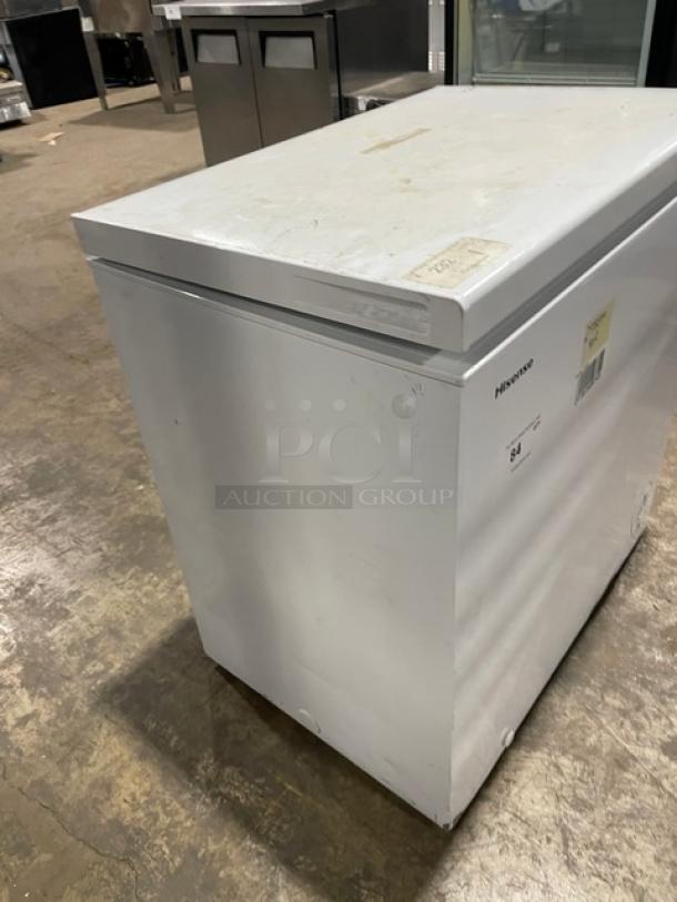 Hisense Commercial White Chest Freezer, Model WFC070M6RWD, 115V, with visible surface marks and labels.