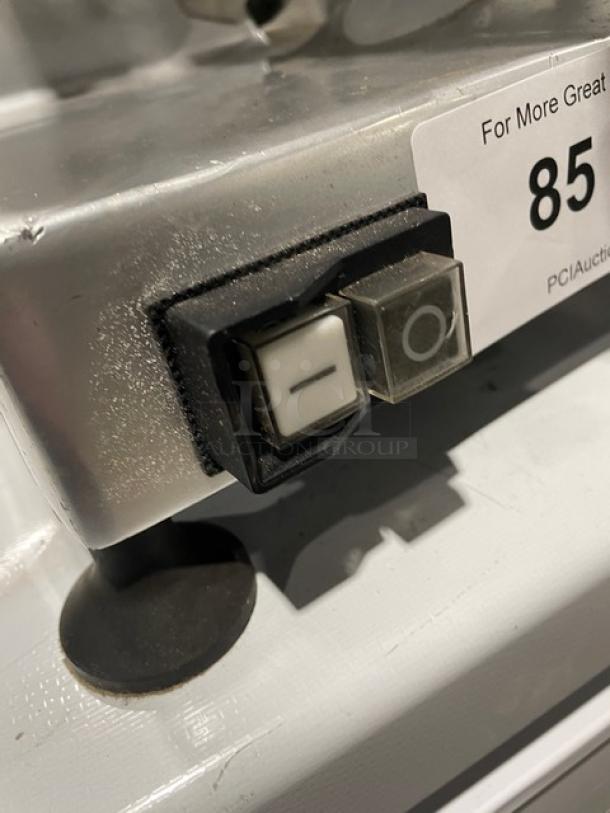 Backyard Pro Butcher Series 9" deli meat slicer switch, model 554SL109E, shown with power buttons and partial serial label.