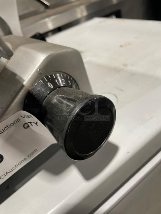 Backyard Pro butcher series 9" meat slicer, model 554SL109E, shown with adjustable slicing knob and power dial, in good condition.