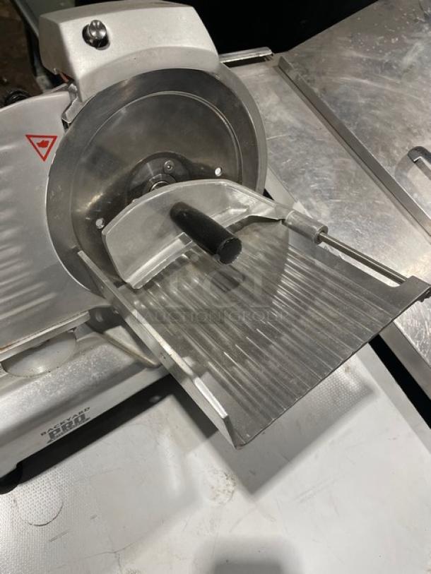 Backyard Pro Butcher Series electric 9" meat slicer, model 554SL109E, on legs, in used condition, 120V.