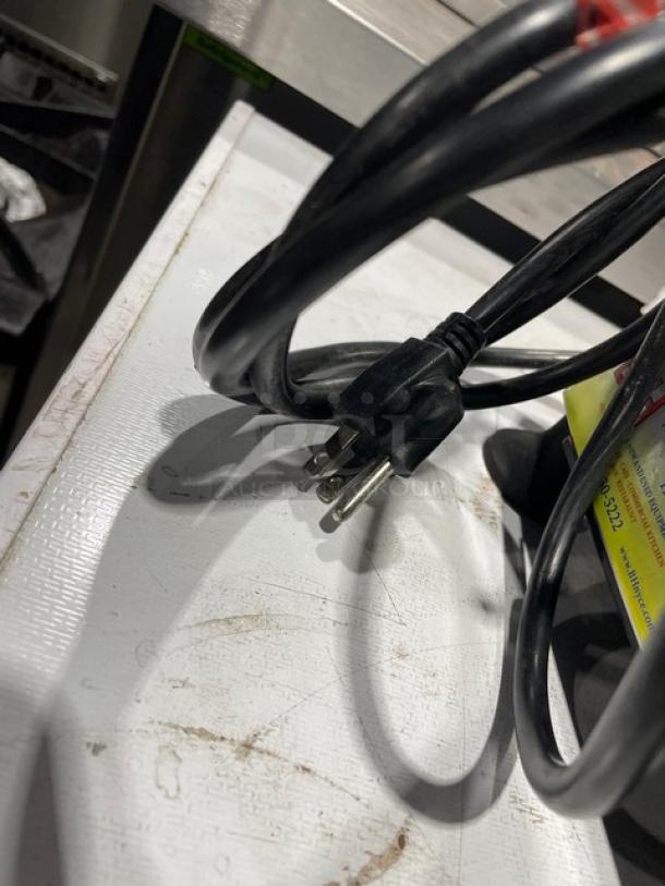 Backyard Pro Butcher Series 9" deli meat slicer model 554SL109E, on legs. Features 120V power cord, clean condition.