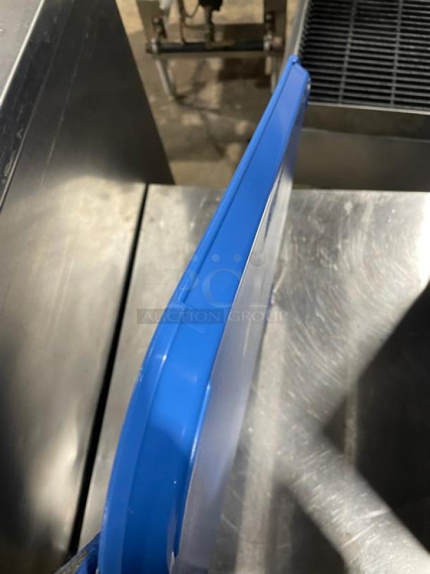 Cambro blue 14"x18" rectangular serving tray, model 1418FF168, new condition, shown on a steel surface.