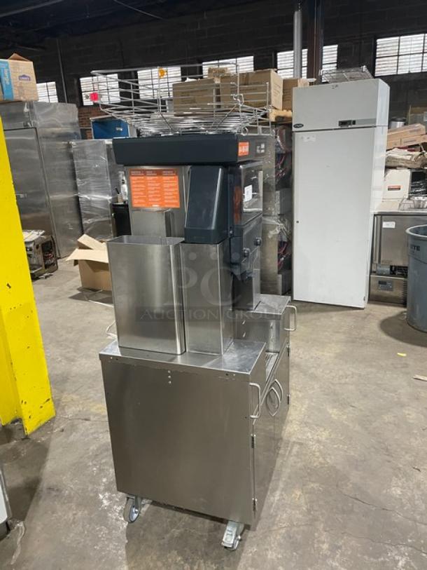 Zummo Nature Adapt Z40CN commercial citrus juicer, stainless steel, dual cabinet, drip tray, on casters, 110-120V, used.