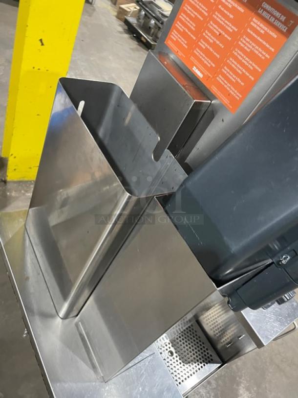 Zummo Z40CN Nature Adapt Series citrus juicer, stainless steel, with drip tray and orange label. Model Z40C-N SN: 02227252AG.