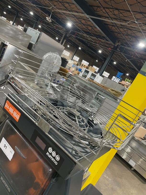 Zummo Nature Adapt Series Z40CN commercial citrus juicer with dual cabinet, stainless steel, on casters, includes drip tray.